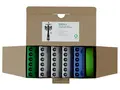 OnePole Connection Kit im geöffneten Karton: fünf 6-polige Reihenklemmen in Grün, Weiß und Blau und ein grün-gelbes Erdungskabel